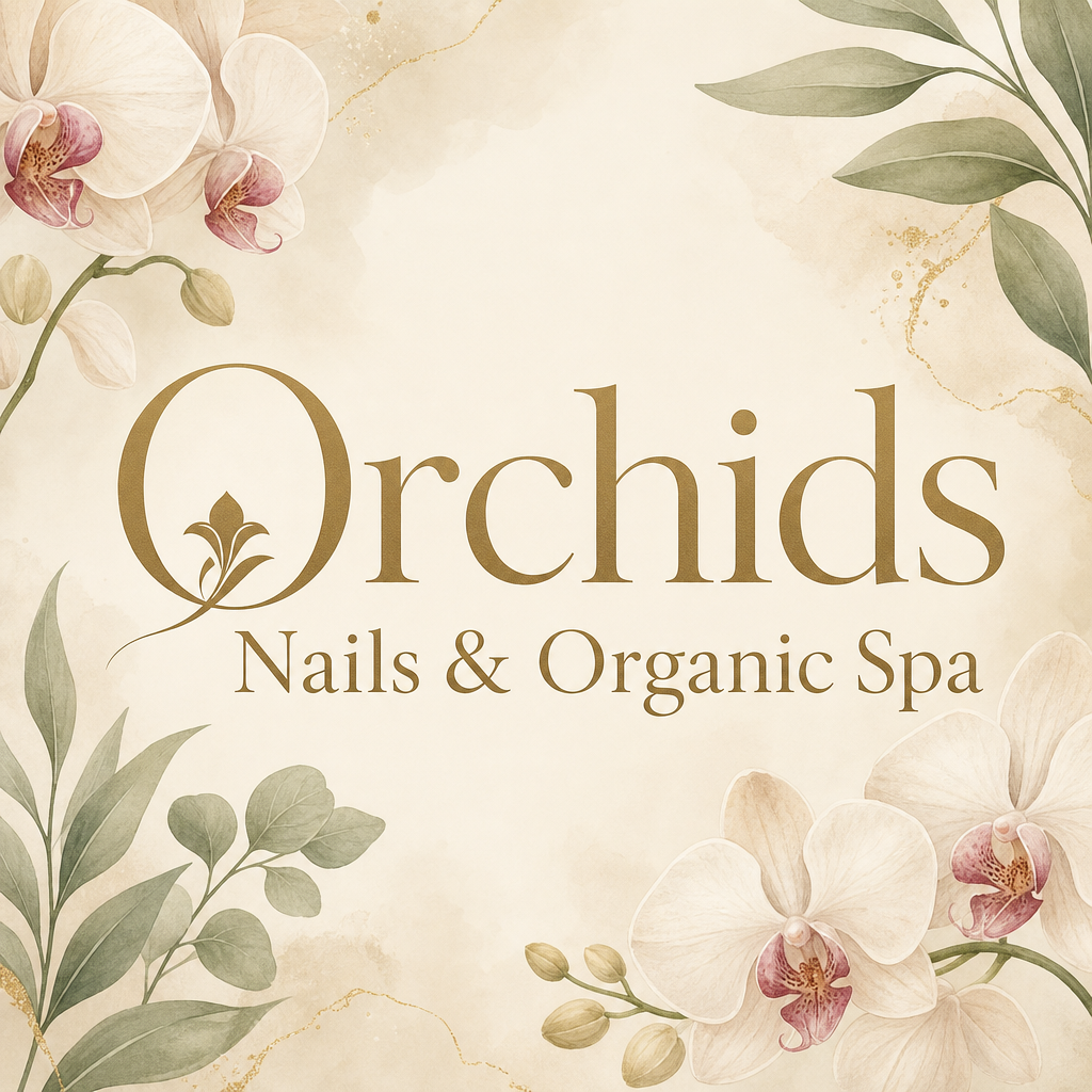 Client hand showing a French-style set with white tips and crystal detailing